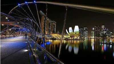 The Helix Bridge, Marina Bay Sands and the ArtScience Museum are some of Singapore's best-known landmarks. Suhaimi Abdullah / Getty Images