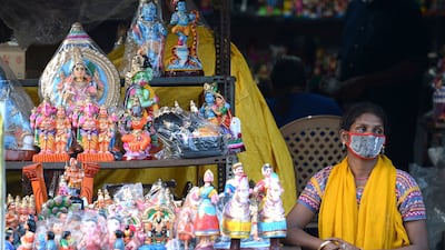 A vendor selling idols in Chennai. AFP