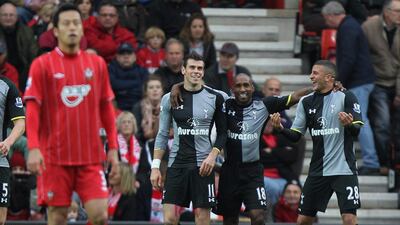Tottenham Hotspur's Gareth Bale is congratulated on scoring the opening goal against Southampton at St Mary's Stadium. PA