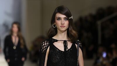 A fringed dress with a crocheted cape