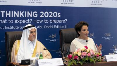 Raghida Dergham, founder of Beirut Institute, with Saudi Arabia’s Prince Turki Al Faisal ahesd of the summit in Abu Dhabi on Saturday. Reem Mohammed / The National