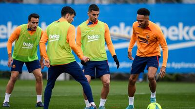 Pedri, Ferran Torres and Pierre-Emerick Aubameyang take part in a training session. AFP