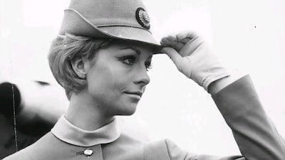Felicity Downer models the new British United Airways air stewardess uniform at Gatwick in July 1967.