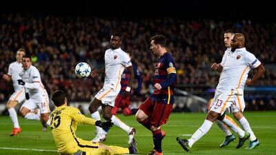 Lionel Messi of Barcelona scores his team’s second goal on Tuesday night against AS Roma in the Champions League at the Camp Nou. David Ramos / Getty Images