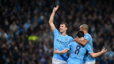 Manchester City's Edin Dzeko, left, Samir Nasri and Vincent Kompany. AFP