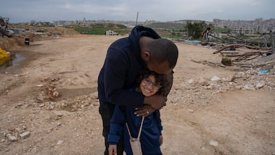 Mr Ifranji with one of his three children