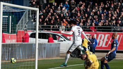 PSG’s Edinson Cavani scores during his Ligue 1 match against Troyes, in Troyes, France, Sunday, March 13, 2016. Zlatan Ibrahimovic scored four second-half goals as Paris Saint-Germain clinched their fourth straight French league title in style, pulverising last-place Troyes 9-0 on Sunday to become champions with a record eight games to spare. (AP Photo/Thibault Camus)