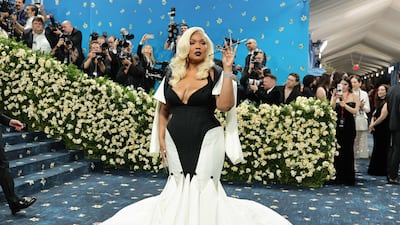 Singer Lizzo joins other global stars at the event. AFP