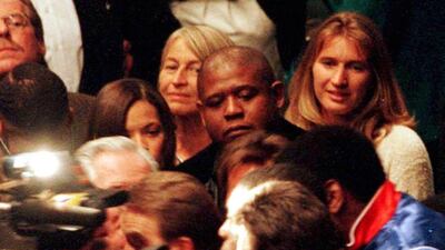 Tennis superstar Steffi Graf is ringside watching Mike Tyson