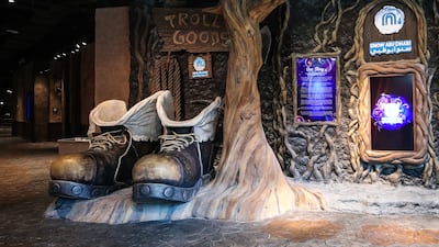 A pair of boots at the entrance belong to Graupel, a mischievous mountain troll