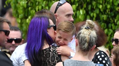People attend the funeral for NSW RFS volunteer Andrew O'Dwyer at Our Lady of Victories Catholic Church in Horsley Park, Sydney. EPA