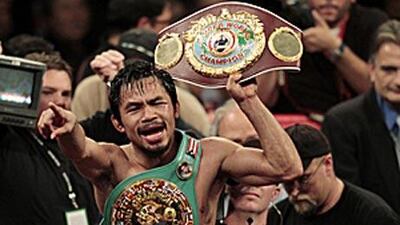 Manny Pacquiao cemented his place as the world's best pound-for-pound boxer after demolishing Miguel Cotto to become the World Boxing Organization welterweight champion.