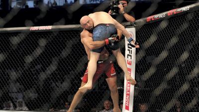 Middleweight bout between Omari Akhmedov (red shorts, Winner) and Zak Cummings in the Early Prelims at UFC 242. Chris Whiteoak / The National
