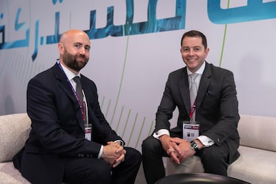 From left, Matthew Nix, head of corporate finance at Dana Gas and Alex Holden, chief operating officer at Levidian. Antonie Robertson / The National