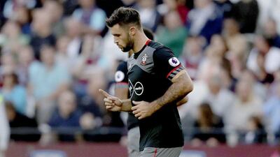 Southampton’s Charlie Austin celebrates scoring his side’s first goal against West Ham. Matt Dunham / AP Photo