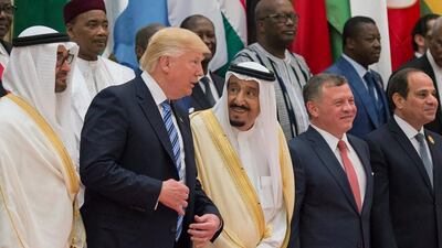King Salman of Saudi Arabia and US president Donald Trump taking part in a group photo at the opening session of the Gulf Cooperation Council summit in Riyadh, Saudi Arabia. EPA/ Saudi Press Agency
