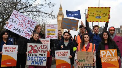 Junior doctors on the picket outside St. Thomas' Hospital in London. EPA