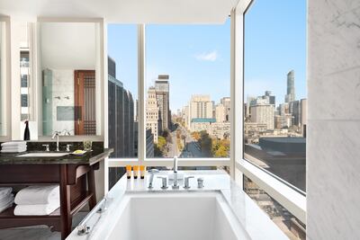The deep-soaking bathtub in a corner room offers spectacular views of downtown Toronto. Photo: Shangri-La