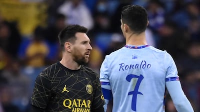 PSG forward Lionel Messi next to long-time rival, Riyadh All-Star's Portuguese forward Cristiano Ronaldo. AFP