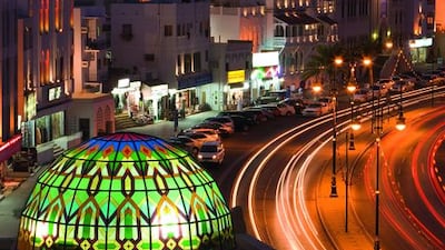 Muttrah Souq’s stained-glass dome, visible in the foreground of a view of the Corniche in the Omani capital city. Gavin Hellier / Robert Harding World Imagery / Corbis