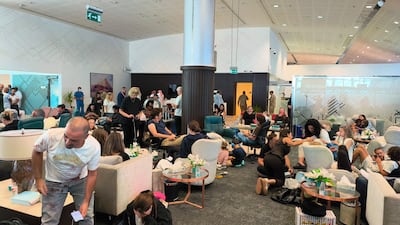 Passengers of the flydubai flight FZ 1073 from Dubai to Tel Aviv are seen inside the Prince Sultan bin Abdulaziz Airport in Tabuk, after their plane was forced to land in Saudi Arabia. AFP
