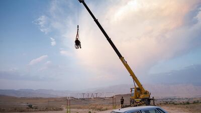 Saeed couldn’t afford extended hospital treatment, so he improvised rehabilitation equipment in his yard, and despite the doctors' predictions, was able to regain the mobility of his hands. Saeed enjoys being hoisted high by a crane, while sitting in a wheelchair, at the Gachsaran Motorcycle Track, Gachsaran. Fereshteh Eslahi, Iran, Podium Photos