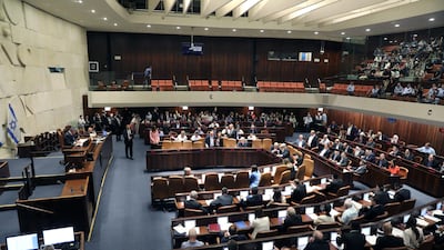 Knesset members vote on dissolving the government last week. EPA