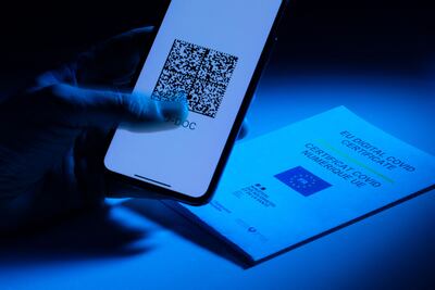 A mobile phone showing the EU Digital Covid Certificate. AFP