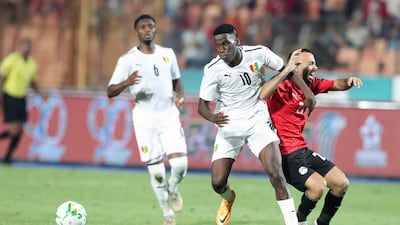 Egyptian player Mohamed Magdi Afsha (R) in action against Guinea player Ilaix Moriba (L) during the Africa Cup of Nations (AFCON) qualification soccer match between between Egypt and Guinea in Cairo, Egypt. EPA