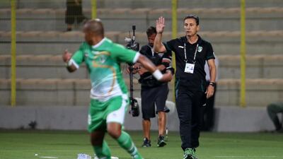 Emirates manager Paulo Comelli directs his side during an Arabian Gulf League match last season against Al Wasl. Pawan Singh / The National / April 17, 2015