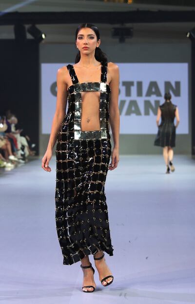 Inspired by New York nightlife, Christian Cowan's designs are daring and bold. EPA