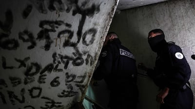 French police search a building in Marseille during a major anti-drug operation. AFP