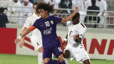 Al Ain midfielder Omar Abdulrahman vies with El Jaish’s Mohammed Al-Jabri. Karim Jaafar / AFP