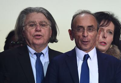 France's far-right presidential hopeful Eric Zemmour, right, with Gilbert Collard, an MEP and former French MP who switched camps to become a key aide to Mr Zemmour, in Cannes, south eastern France, on January 22 2022. AFP