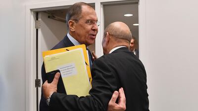 France's Foreign Minister Jean-Yves Le Drian (R) meets with Russia's Foreign Minister Sergei Lavrov during a bilateral meeting on the sidelines of the UN General Assembly. AFP