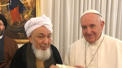 Imam Abdullah bin Bayyah, chairman of the UAE Fatwa Council, and Pope Francis meet in the Vatican City on Wednesday. Wam