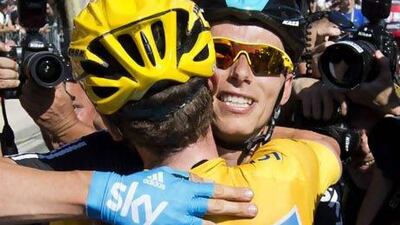 Sir Bradley Wiggins hugs Team Sky teammate Chris Froome during last year's Tour de France, but will he be so embracing if he is no longer team leader at this year's event? Nathalie Magniez / AFP