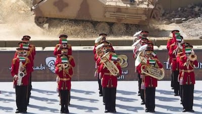 A military demonstration during the opening ceremony of IDEX 2011 at the Abu Dhabi National Exhibition Centre.