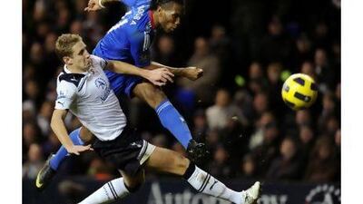 Didier Drogba unleashes a shot for Chelsea's equaliser against Tottenham Hotspur last night. Adrian Dennis / AFP