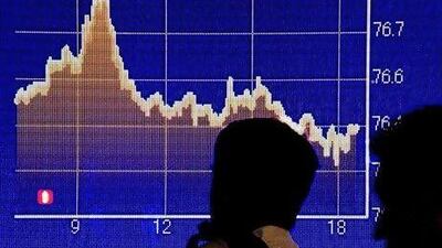 Global stock markets ended a turbulent week with shares falling sharply. In Japan, the Nikkei ended at a five-month low and the dollar was near its postwar record low of 76.25 yen. EPA