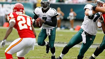 Michael Vick, in action for the Philadelphia Eagles last season against the Kansas City Chiefs, is facing being released by the Eagles after being linked with a shooting incident.