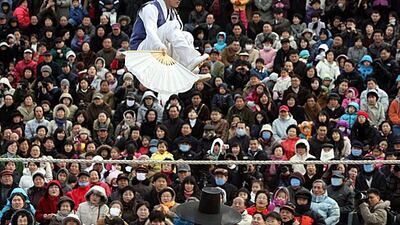 epa03017551 An undated file photo taken in an undisclosed location shows traditional Korean 'jultagi (tightrope walking),' which the UNESCO Intergovernmental Committee for the Safeguarding of the Intangible Cultural Heritage decided to add to its list at a meeting in Bali, Indonesia, on 28 November 2011. EPA/YONHAP NEWS AGENCY