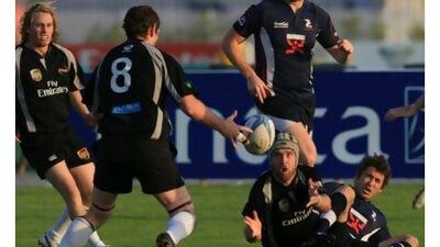 A Dubai Hurricanes player passes the ball during last week's defeat to the Dragons.