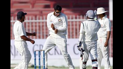 Ahmed Raza of UAE celebrates after dismissing Andrew White of Ireland during the fourth day during of the ICC match in Sharjah. (Satish Kumar / The National)
