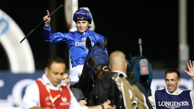 William Buick, atop Jack Hobbs, celebrates winning the Dubai Sheema Classic. Pawan Singh / The National