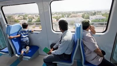 Novelty value: interested passengers ride the Metro's new Green Line.