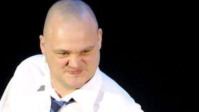 The comedian Al Murray performs on stage. Courtesy EMPICS Entertainment