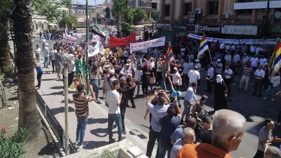 Pro-democracy demonstrators march in the centre of the southern Syrian city of Suweida, on August 16, 2022, at the one year anniversary celebration of the protest movement against President Bashar Al Assad, in the mostly Druze province. Photo: Suhail Thubian.