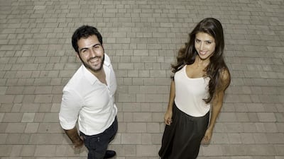 Models Sajjad Delafrooz, left, an Iranian, and Graciela Pischner, a Brazilian, are two of the country’s most recognisable faces after appearing in advertising campaigns all over the UAE. Jaime Puebla / The National