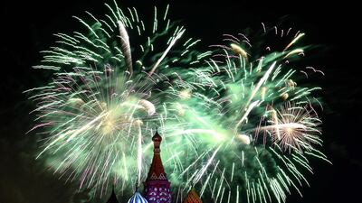 Fireworks explode above Saint Basil’s cathedral during the Spasskaya Tower international military music festival on the Red Square in Moscow. Vasily Maximov / AFP